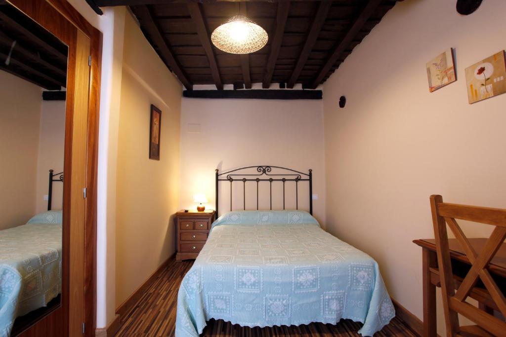 Apartamentos Hervasypunto Rum bild