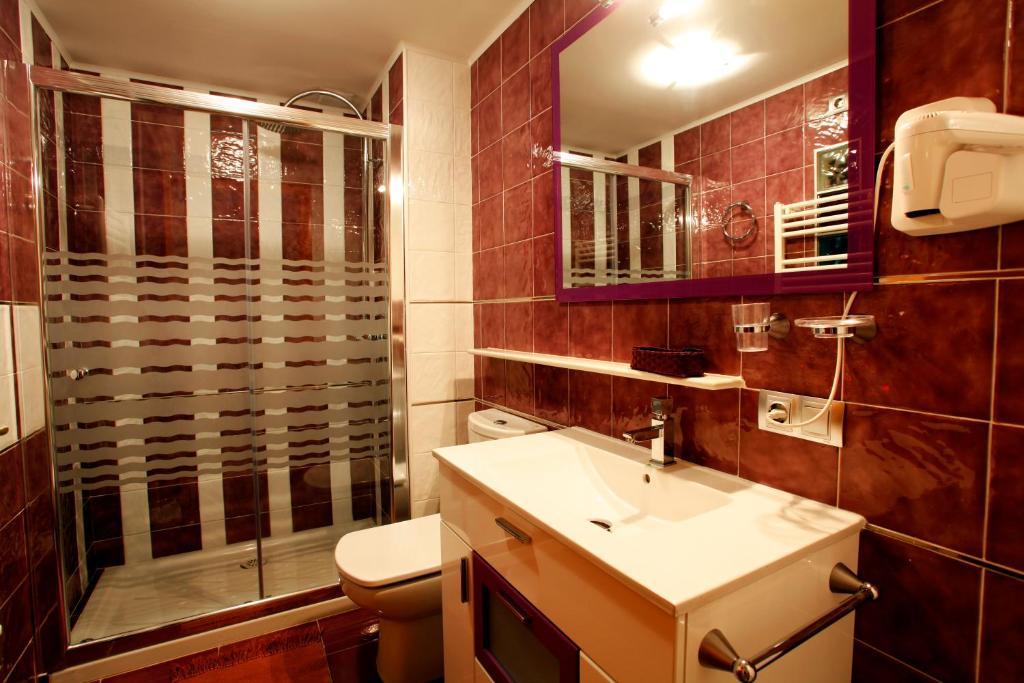 Apartamentos Hervasypunto Rum bild